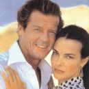 Carole Bouquet and Roger Moore