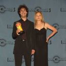 Director Doug Liman and Ellen Barkin attends The 1997 MTV Movie Awards