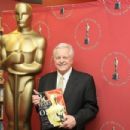 Official biographer of the Academy Awards Robert Osborne poses for a photograph at the book signing of "80 Years of the Oscar: The Official History of the Academy Awards" at Borders Columbus Circle on February 9, 2009 in New York City