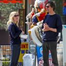 Actress Kirsten Dunst and a male friend out for lunch in Toluca Lake, California on March 20, 2012