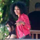 Racist, former NBA team owner Donald Sterling's ex-girlfriend V. Stiviano has a laugh when she takes a picture of a random guys t-shirt while out for lunch in Sherman Oaks, California on August 7, 2014