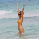 Elise Dalby in Yellow Bikini on the beach in Tulum