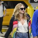 Heather Graham – With boyfriend John De Neufville as they arrive to Miami International Airport