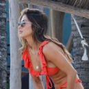 Arianny Celeste in Red Bikini on the beach in Tulum