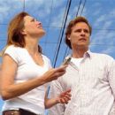 Dylan Neal and Lucy Lawless