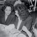 Gene and Diana Ross attend a party, celebrating Bette Midler's series of performances at Radio City Music Hall, at Mortimer's in New York