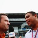 Former Brazilian footballer Ronaldo is interviewed by former F1 driver Rubens Barrichello before the Italian Formula One Grand Prix at Autodromo di Monza on September 8, 2013 in Monza, Italy