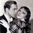 Claudette Colbert and David Manners