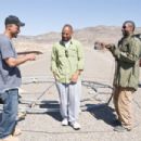 (L-r) Directors ALBERT HUGHES and ALLEN HUGHES with DENZEL WASHINGTON on set of Alcon Entertainment's action adventure film 'The Book of Eli,' a Warner Bros. Pictures release. Photo by David Lee. TM & © 2009 Warner Bros. Entertainment Inc. All