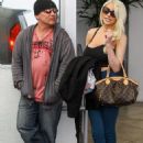The day after Courtney spent the night cosying to the much older Edward Lozzi. She stepped out with her estranged husband Doug Hutchison in Beverly Hills, California