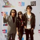 Musician Gene Simmons, Alex Esso and Nick Simmons arrive at the 2011 VH1 Do Something Awards at the Hollywood Palladium on August 14, 2011 in Hollywood, California.