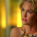 Kelly Carlson- as Laurie Atherton