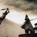 Spartan sword meets Persian whip as Stelios (MICHAEL FASSBENDER) leaps over several guards to counter the attack of the Persian emissary (TYRONE BENSKIN) in Warner Bros. Pictures’, Legendary Pictures’ and Virtual Studios’ action drama &#