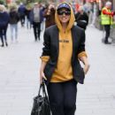 Myleene Klass – Wear a mustard yellow hoodie and tracksuit bottoms in London