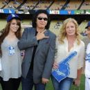 Musician Gene Simmons attends the Dodgers v Ny Mets game to throw out the first pitch of the game at Dodger Stadium pictured with (L-r) Emily Tweed, Sophie Simmons, Shannon Tweed and Jamey Carroll baseball player on July 5, 2011 in Los Angeles, California