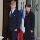 Robert Redford & Sibylle Szaggars   (Arrives at the Elysee Palace, October 14, 2010 in Paris, France.)