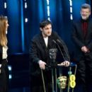 Justine Triet and Arthur Harari with Andy Serkis - 2024 EE BAFTA Film Awards
