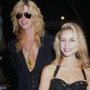 Duff McKagan and Mandy  attend the 1989 MTV Video Music Awards, held at the Universal Amphitheatre in Los Angeles, California, 6th September 1989