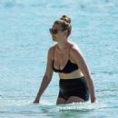 Zoe Salmon – With her husband William Corrie on their family holiday in Barbados