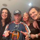 Sally Wood, Bruce Dickinson, Leana Dolci and Ronnie Wood in the dressing room of the O2 Arena ahead of the Iron Maiden show in London on July 8, 2023