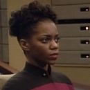 Lanei Chapman as  Ensign Sariel Rager in Star Trek: The Next Generation