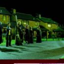 (L-r) GEORGE HARRIS as Kingsley Shacklebolt, DANIEL RADCLIFFE as Harry Potter, BRENDAN GLEESON as Alastor ‘Mad-Eye’ Moody, NATALIA TENA as Nymphadora Tonks, BRIDGETTE MILLAR as Emmeline Vance, and PETER CARTWRIGHT as Elphias Doge in Warner Bro