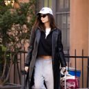 Emily Ratajkowski – Spotted with luggage in New York wearing a Yankees hat