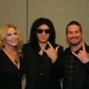 Gene Simmons, Shannon Tweed and Matt Nathanson pose at the 2015 Starkey Hearing Foundation So The World May Hear Gala at the St. Paul RiverCentre on July 26, 2015 in St. Paul, Minnesota.