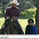 Director Michael Mayer reviews a scene with star Tim McGraw on the set of FLICKA. Photo Credit: Merrick Morton. © 2006 Twentieth Century Fox.