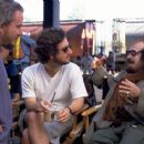 Directors/Screenwriters Larry Karaszewski and Scott Alexander with Danny DeVito on the set of Universal's comedy Screwed - 2000