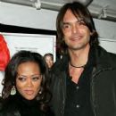 Robin Givens and Marcus Schenkenberg