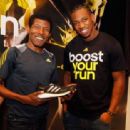 Two-time Olympic Champion Haile Gebrselassie and Olympic Medalist Yohan Blake pose for a photo at the unveiling of the adidas Energy Boost sneaker at the Javits Convention Center North on Febuary 13, 2013 in New York City