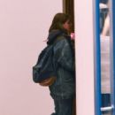 Suri Cruise – Gears up for 18th birthday with pink flowers in hand in New York
