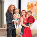 Nikita Dzhigurda and Marina Anisina with their kids