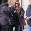 Shania Twain – Wearing a brown leather coat and flares at the BBC studios in London