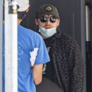 Georgia Groome and Rupert Grint – Wearing face masks in London