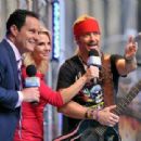 'FOX & Friends' co-hosts Brian Kilmeade and Elizabeth Hasselbeck talk to singer/TV personality Bret Michaels after his performance on 'FOX & Friends' All American Concert Series outside of FOX Studios on July 18, 2014 in New York City