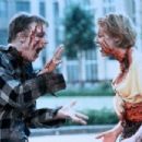 Julie Bowen and Vince Vieluf in An American Werewolf in Paris (1997)