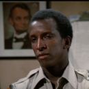 Dorian Harewood- as Sheriff Claudell Cox