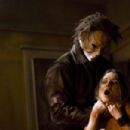 Tyler Mane (Michael Myers) and Kristina Klebe (Lynda) star in Rob Zombie's Halloween. Photo by: Dimension Films, Marsha Blackburn LaMarca.