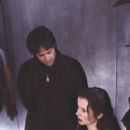 Director Kurt Wimmer with Emily Watson on the set of Miramax's Equilibrium - 2002