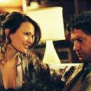 Claudette Mink ('Judy,' left) and Gerard Butler ('Neil Randall,' right) star in Lionsgate Home Entertainment's Butterfly on a Wheel.