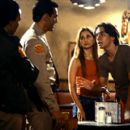 Trooper Weston (Avis-Marie Barnes) and Trooper Gideon (Jon Beshara) listen to Justin Long and Gina Philips in United Artists Films Jeepers Creepers - 2001