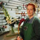 (Lisa) At work at the flower shop. She specializes in funeral arrangements.