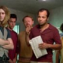 (Left to right) GRANT MONOHON as Emaciated Smoker, JOHN BOYD as One-Eyebrow Smoker, JARED HARRIS as Goatee Smoker, JEFFREY WRIGHT as Mr. Dury, JOSEPH D. REITMAN as Long Haired Smoker and ETHAN COHN as Glasses Smoker in Warner Bros. Pictures’ and Leg