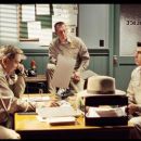 Dan Lauria as Officer Dawson, Robert Patrick as Officer Vernon and Sage Brocklebank as Stu in ALIEN TRESPASS, directed by R.W. Goodwin. Courtesy of Roadside Attractions