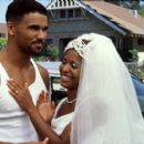 Terry (Shemar Moore) and fiancée BeBe (Susan Dalian) work out pre-wedding jitters in Gary Hardwick's The Brothers from Screen Gems - 2001
