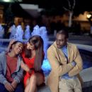 Calvin (Lil Bow Wow) enjoys the attentions of a reporter, Janet (Sandra Prosper), while Tracy (Morris Chestnut), Janet’s unhappy, would-be suitor, looks on in 20th Century Fox's Like Mike - 2002