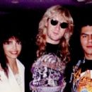 Joe Elliott and Karla Rhamdani with a fan in 1993