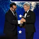 Harrison Ford got emotional accepting the the Career Achievement Award at Sunday night’s Critics Choice Awards. The actor was introduced by his Indiana Jones and the Dial of Destiny director, James Mangold, who called Ford a “hypergiant.”